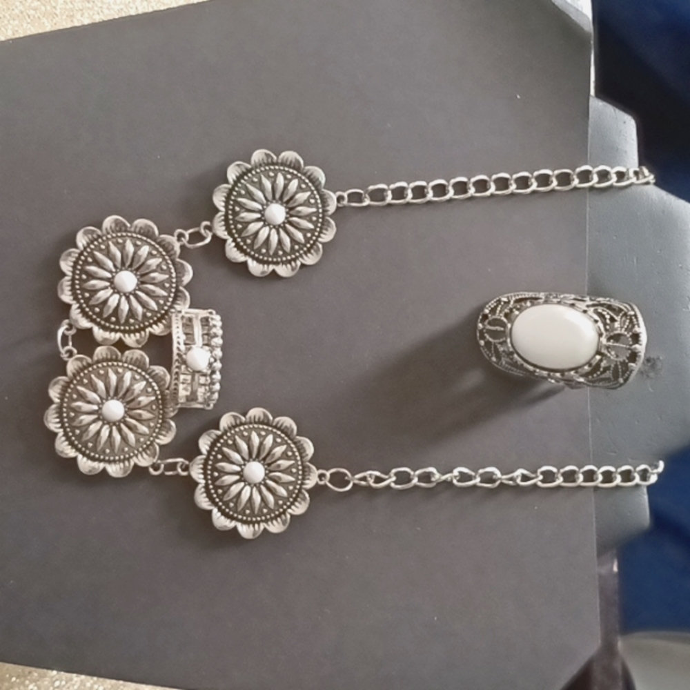 White pearls with silver dark Chrome accents two rings and necklace